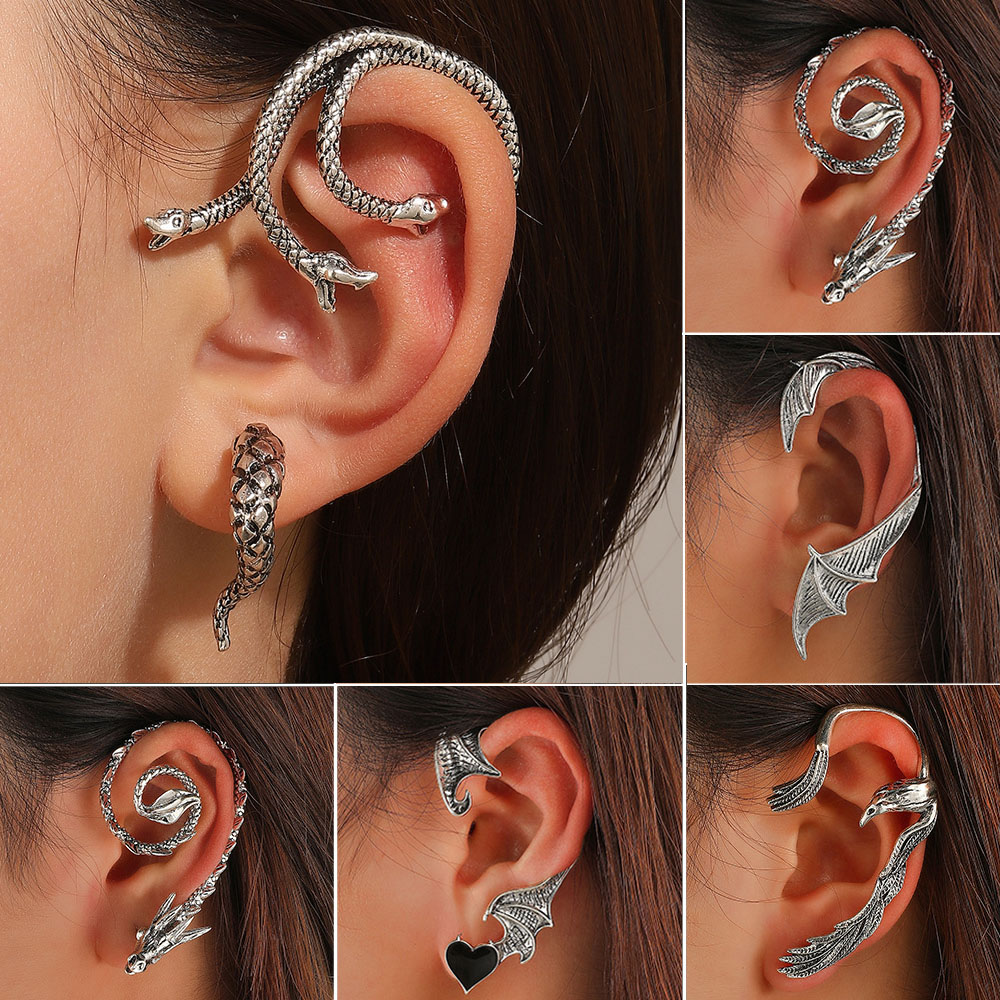 Vintage Fashion Guild - Boucles d'oreilles gothiques à trois têtes